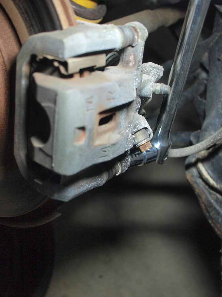 DIY Brake Job Rear Tacti's Garage