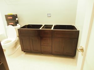 Vanity cabinet is installed by the cabinet guys.  exactly the color we like!
